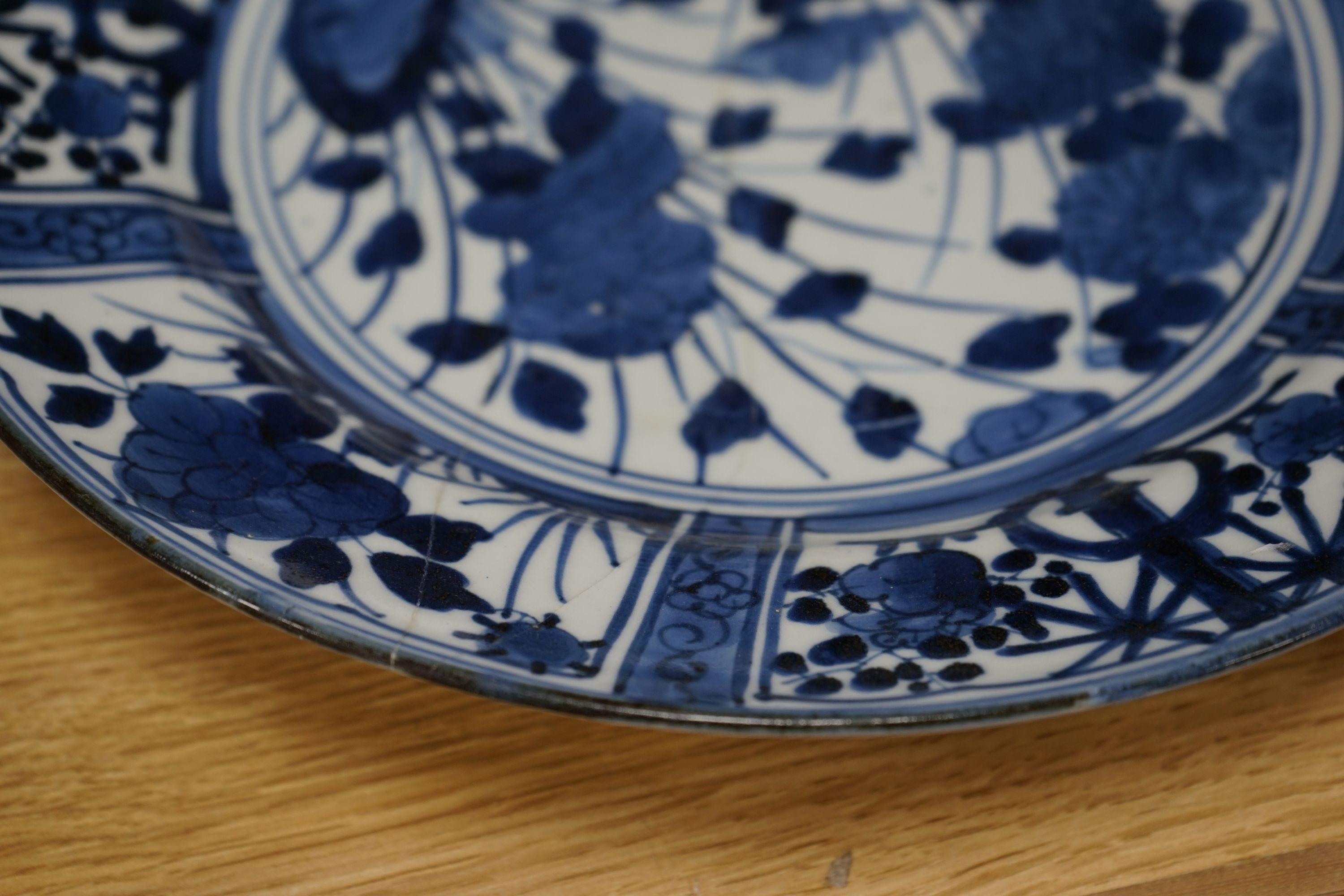 A Japanese blue and white dish, a Chinese blue and white meiping and a clobbered plate 33cm